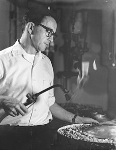 Frederick Miller annealing a sterling bowl