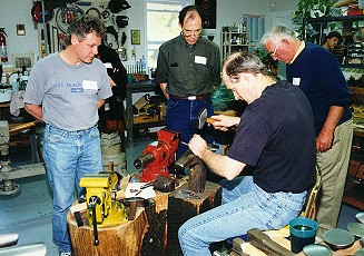 Peter Erickson marking a forged spoon at SilverWorks